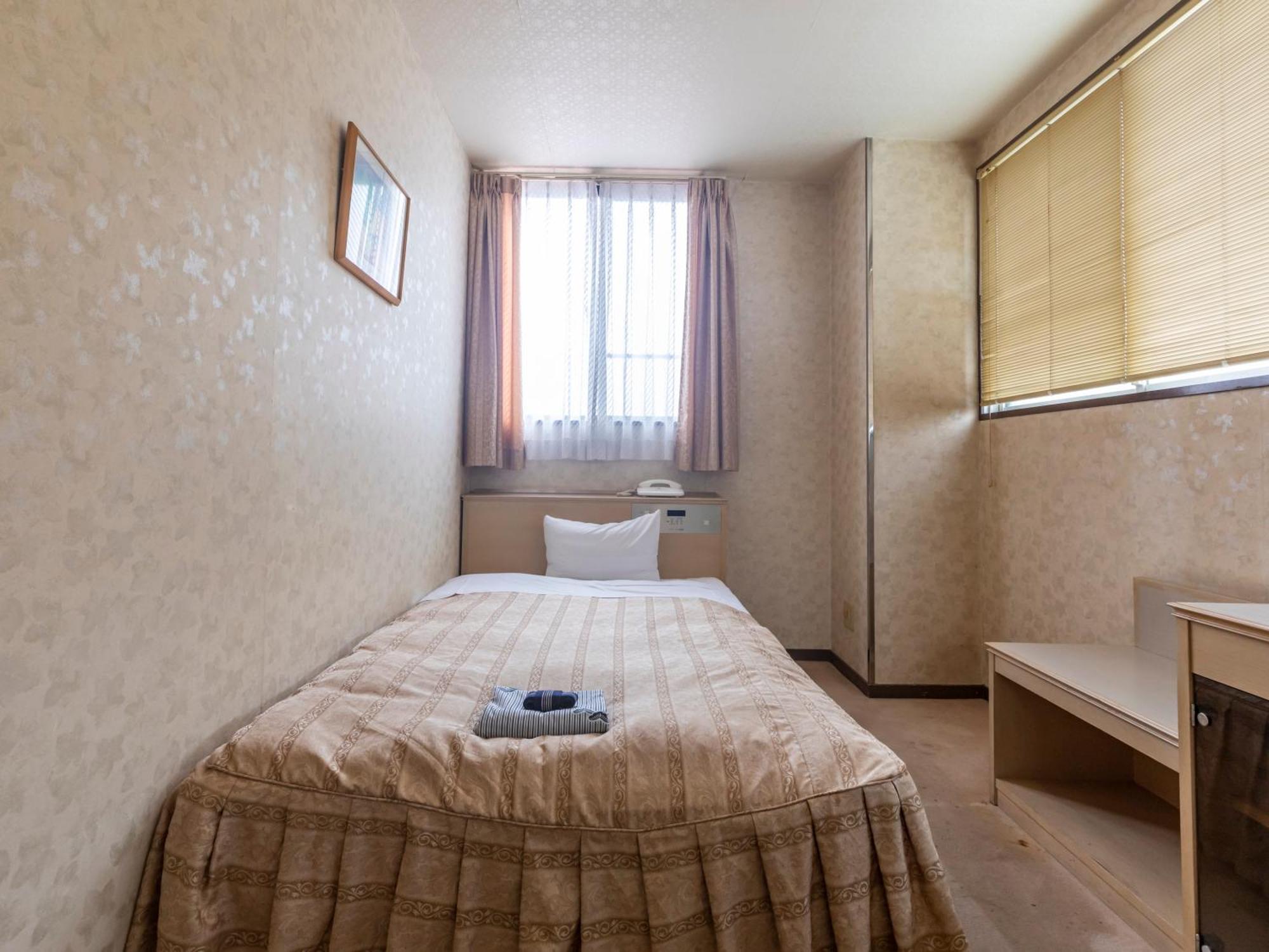 Hotel Tabist Annex Matsumi Beppu Habitación foto